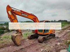 Wykorzystany grabarz Doosan Wysokiej jakości wykorzystany grabarz rowerowy Doosan Dx150W Doosan Dx150W Dh150W oryginalny używany grabarz drapieżnik Dx140W